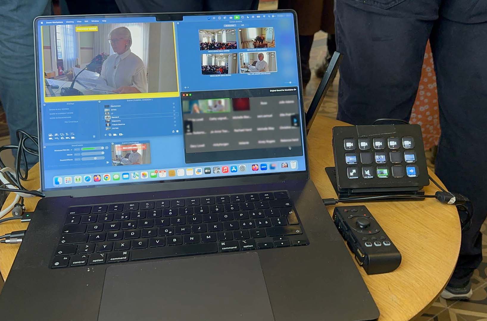 Multi-camera wedding live streaming control on a laptop with a stream deck